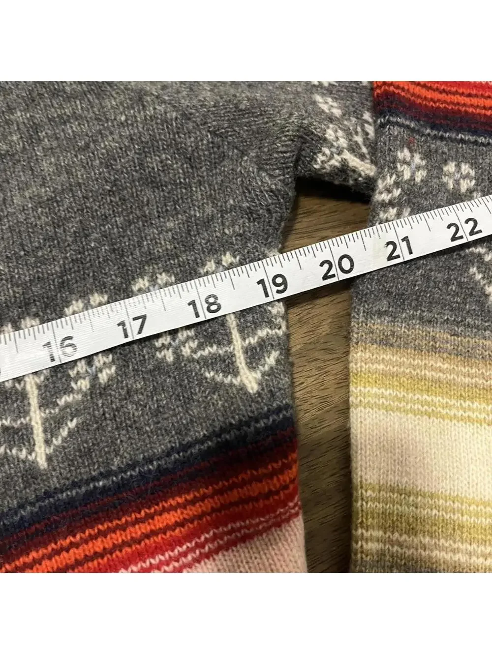 Free people grey sweater with red stripes and flower pattern